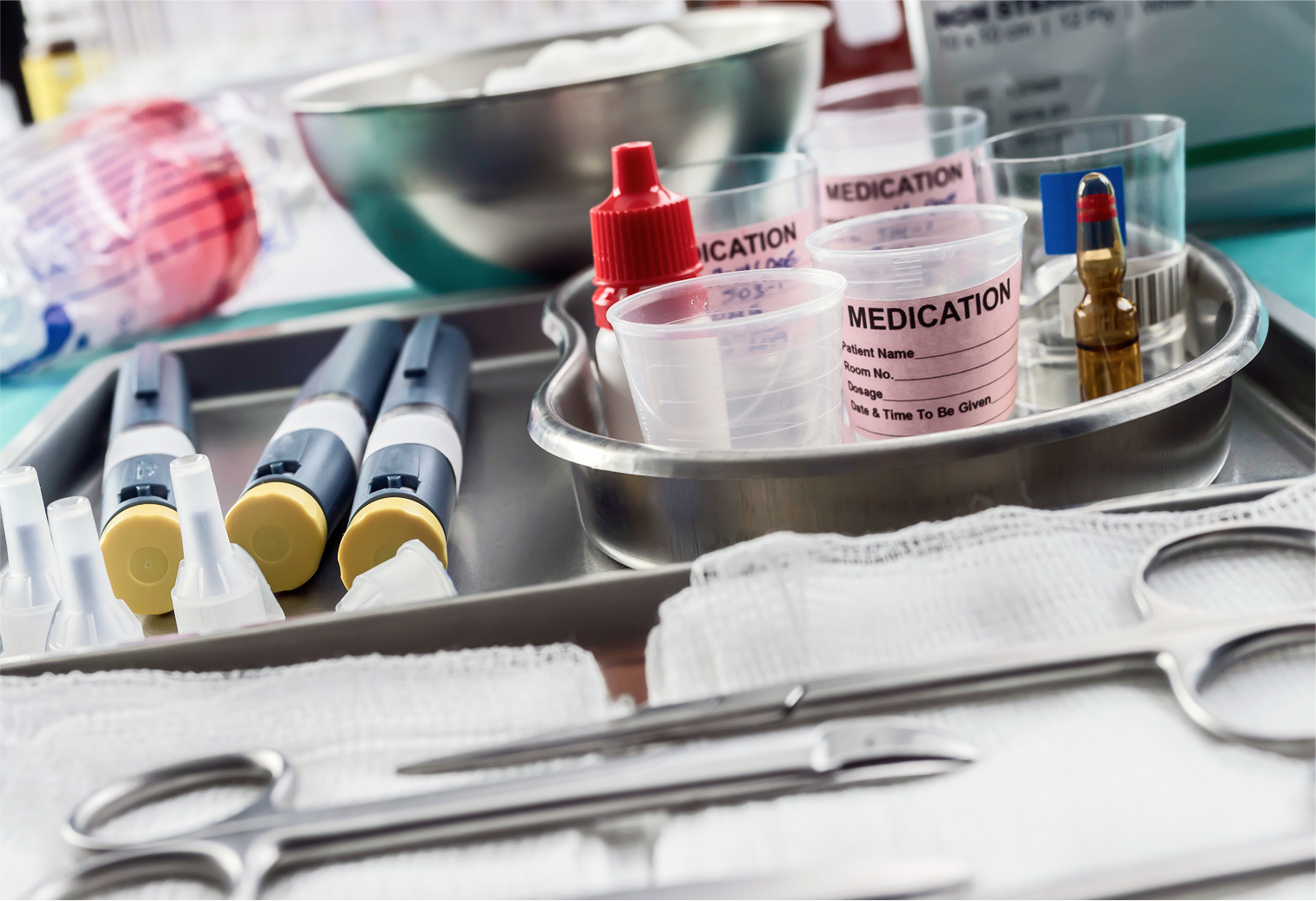 Sterile medical equipment neatly arranged on stainless steel trays in a hospital setting